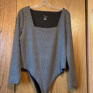 A New Day Asymmetrical Blue and Black Long Sleeve Bodysuit